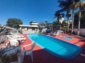 BRUNO KLEMTZ DK4 CASA PISCINA CHURRASQUEIRA SINUCA 3 AR WIFI 3 VaGAS 3 DORM